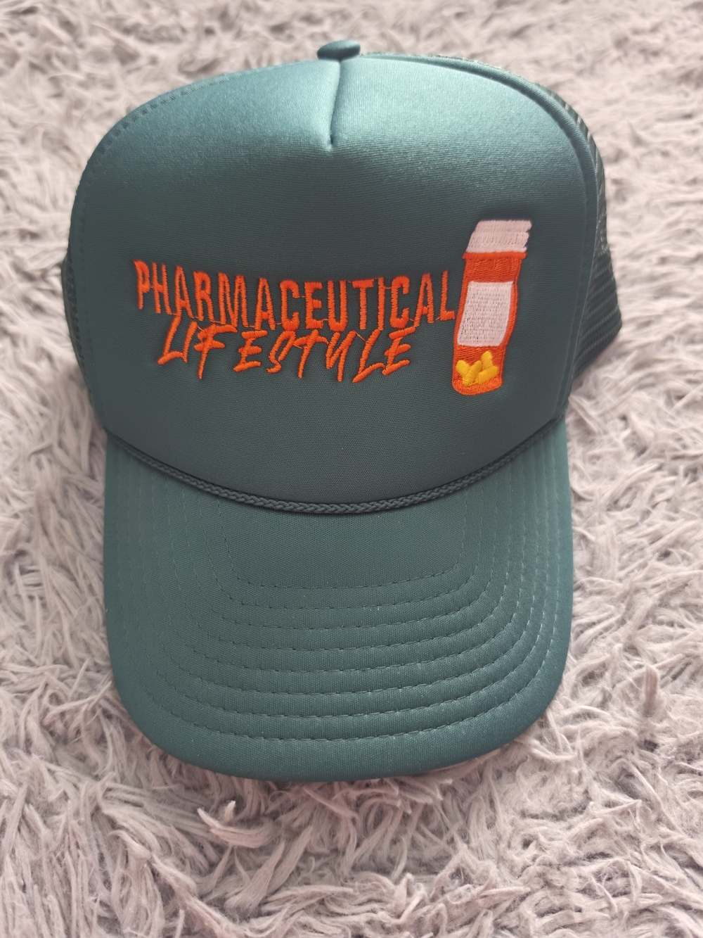 Nissin Green Trucker Hat, One Size, Adjustable, Mesh Back, Pharmaceutical Theme
